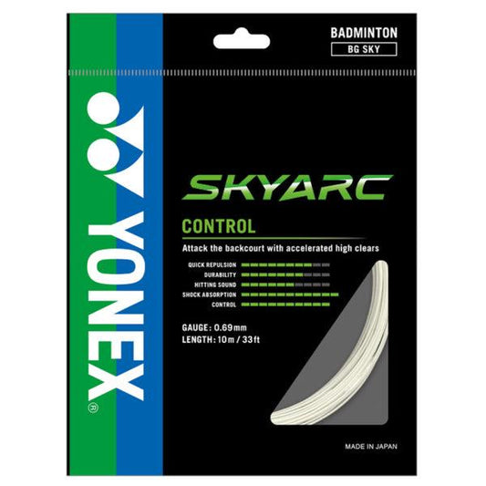 The packaging of the Yonex Skyarc 0.69mm Badminton String in white displays a green and black design, with text emphasizing features such as quick repulsion and shock absorption. The string has a gauge of 0.69mm and comes in a 10m pack, made in Japan by Yonex.