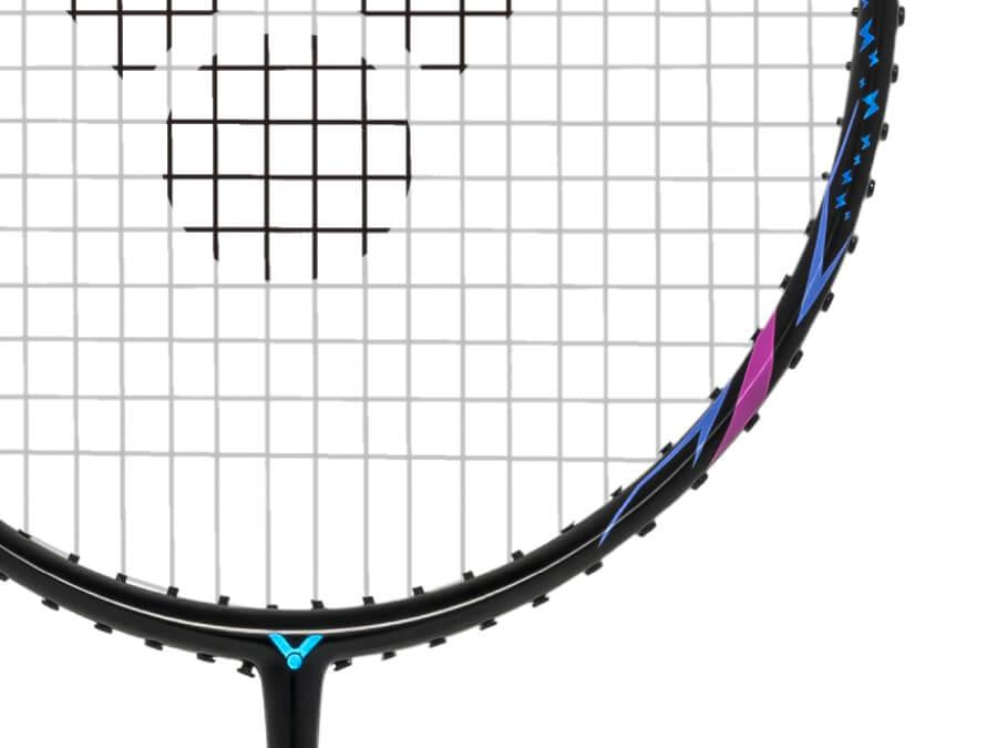 The image showcases a close-up of the Victor Auraspeed 9000 C Badminton Racket (Frame Only) by Victor, featuring a sleek black frame enhanced with vibrant blue and purple accents. The racket incorporates free core technology along with tightly woven grid pattern strings that provide precise control for intermediate-level club players. The background is plain white.