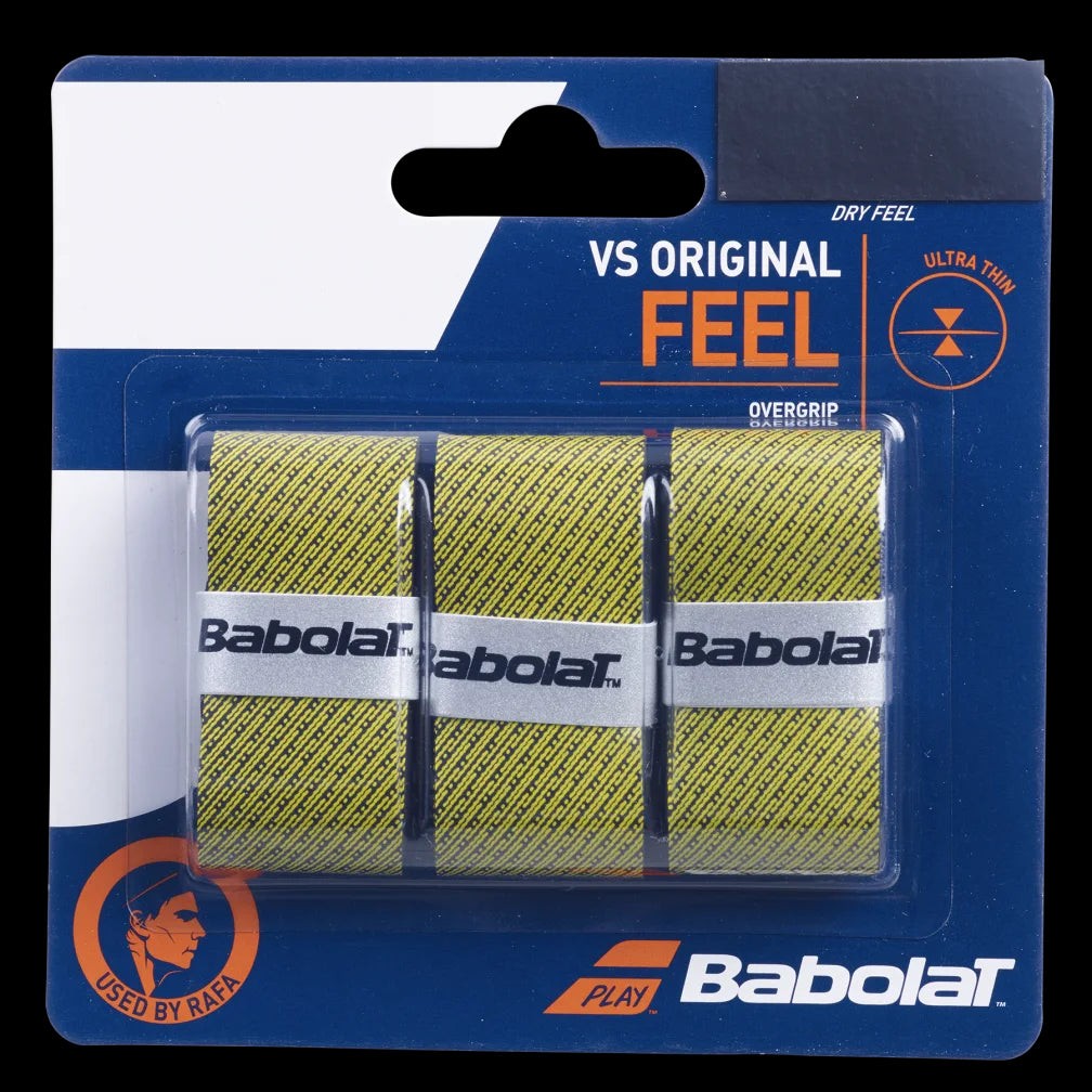 The packaging for the Babolat VS Original X3 Badminton Overgrip showcases three yellow overgrips with black diagonal lines. The predominantly blue design emphasizes the Babolat branding and prominently features the phrase "Used by Rafa.