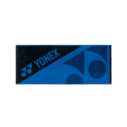 The Yonex AC1108EX Badminton Sports Towel - Blue Black is a rectangular 100% cotton towel that prominently displays the Yonex logo and name in contrasting colors. It features geometric shapes in the background, offering both a stylish and highly absorbent solution for all your athletic needs.