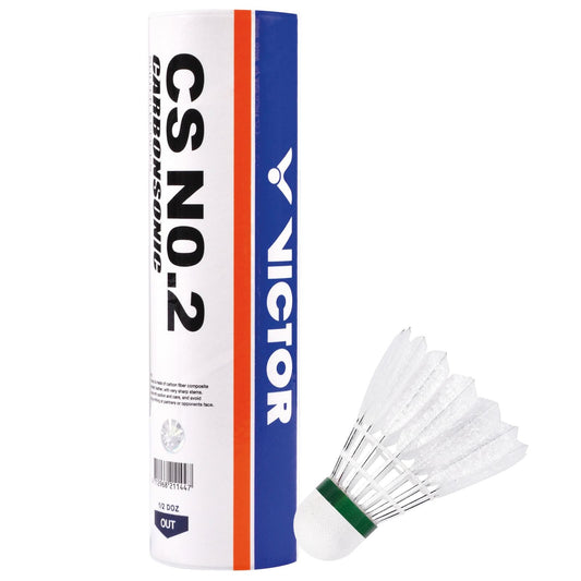 Beside a single shuttlecock lies a set of Victor Carbonsonic CS No. 2 Hybrid Badminton Shuttles in a tube that sports a white, blue, and orange design with the recognizable Victor logo. The shuttlecock features a durable white nylon skirt and has a distinct green band around its base.