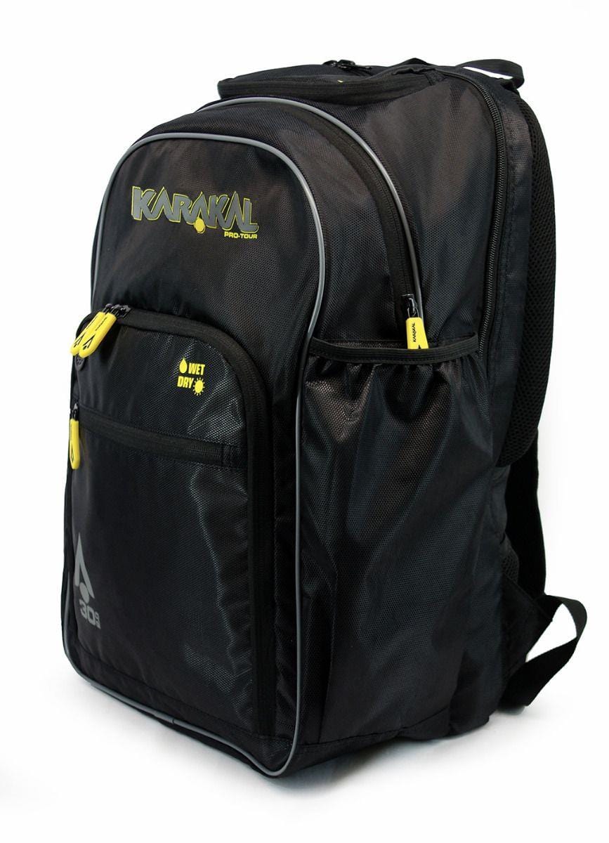 The Karakal Pro Tour 30 2.0 Badminton Backpack - Black, from Karakal, is a stylish black backpack featuring multiple compartments and eye-catching yellow accents, with the "Karakal" branding prominently displayed on the top front pocket. It includes mesh side pockets and a convenient "Wet Dry" labeled zipper for organized storage.