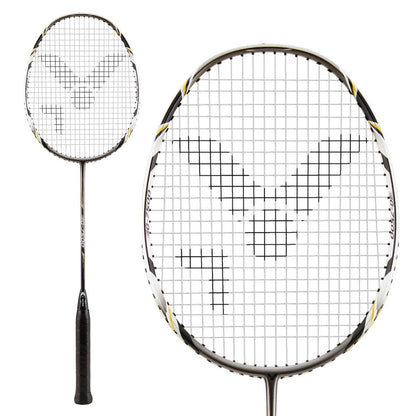 The Victor G-7500 Badminton Racket, crafted by Victor, features a curved shaft and a black grip. Its head is strung with Ashaway Rally 21 Fire strings in an impressive "V" pattern. This full carbon racket for beginners displays elegant details in black, white, and gold from various angles.