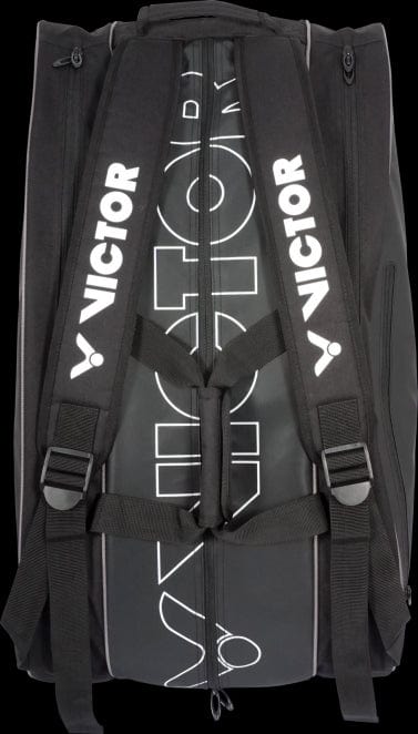 The Victor Multithermo 9031 Badminton Bag - Black is the ideal racket bag, showcasing the Victor branding prominently. Designed to hold all your essential sports gear, it includes padded shoulder straps and several compartments for convenience.