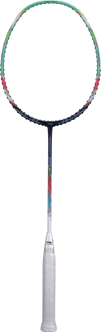 A close-up image showcases the Li-Ning Aeronaut 7000 Instinct Badminton Racket - Blue / Green, featuring a white grip handle. The dark blue frame is enhanced by colorful green accents along the side, with strings tightly strung across its oval-shaped head. The plain white background highlights the Li-Ning branding and INSTINCT design.