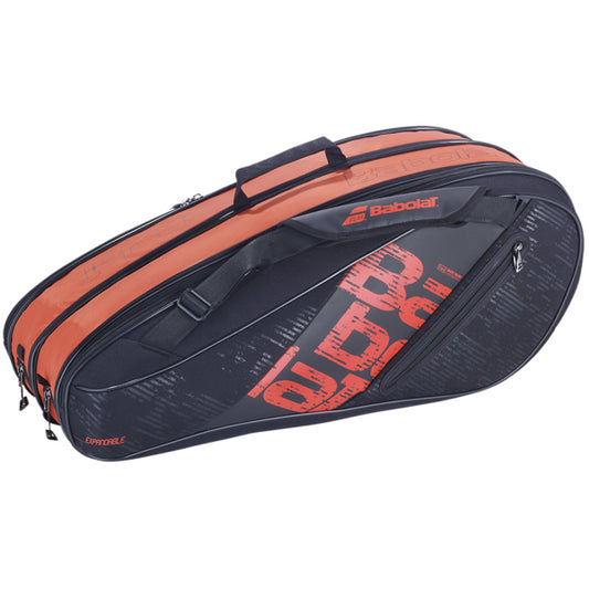 The black and red Babolat Expand Team 9 Racket Bag from the Expand Team collection offers multiple zippered compartments and a durable carrying handle. The brand name "Babolat" and the word "PURE" are prominently displayed in red on the side.