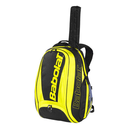 The Babolat Pure Aero Backpack in yellow and black features a top racquet holder, prominently displaying the brand's name in large yellow letters. This sleek bag boasts multiple ventilated compartments for optimal storage.