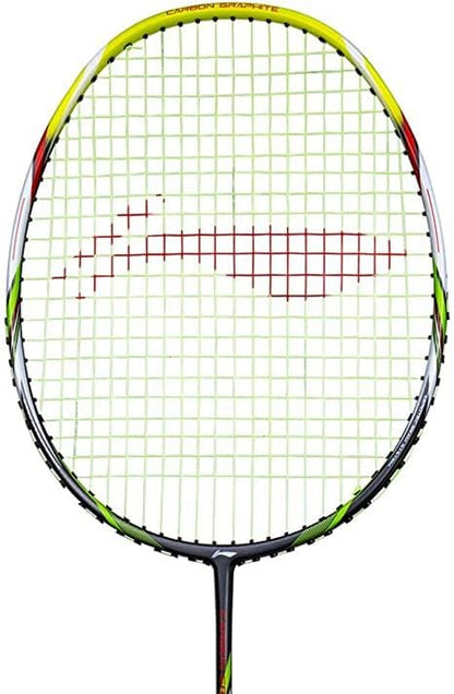 Close-up image of the Li-Ning Carbon Series A900 badminton racket featuring a colorful grip. The Dynamic-Optimum Frame enhances performance, while the strings form a grid pattern with a subtle graphic design. The frame boasts vibrant grey and green accents.