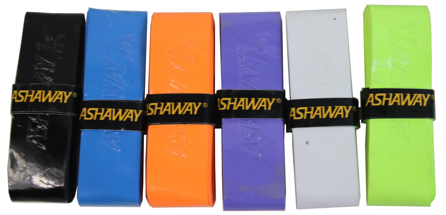 A collection of six Ashaway Grip It squash racket grips showcases vibrant colors, including black, blue, orange, purple, white, and green. Each overgrip is secured with a black band labeled "Ashaway" and features GRIPIT Technology for improved performance.