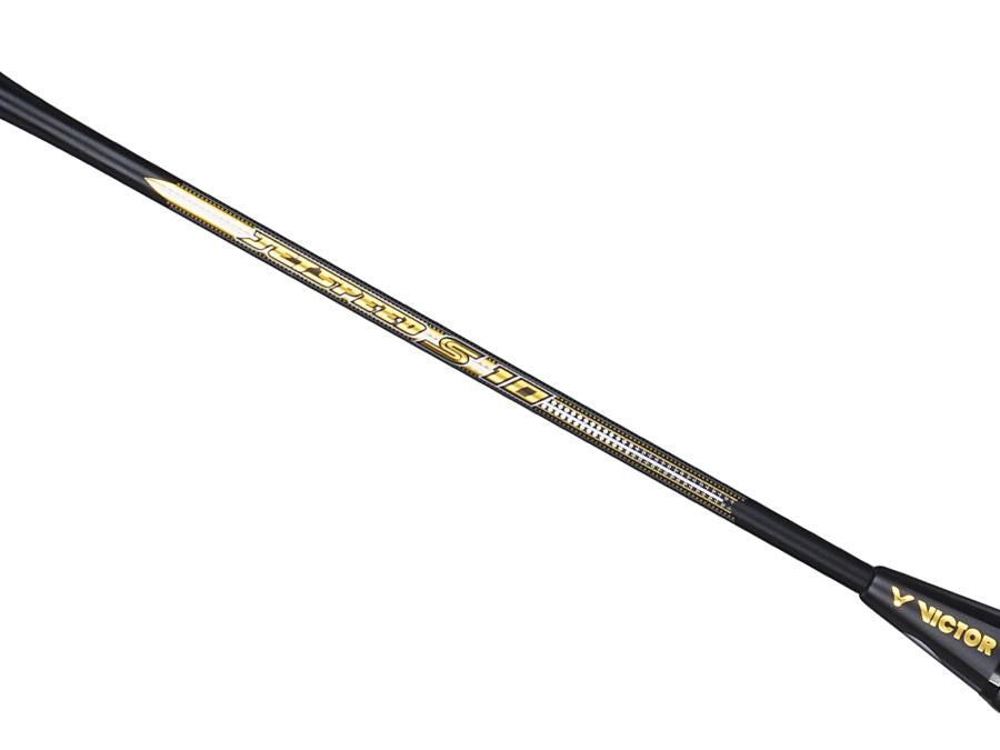 Close-up of a Victor Jetspeed S10C badminton racket shaft in black, made from Japanese carbon fibre, adorned with the name "Victor" and "Jetspeed S10C" in gold lettering.