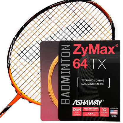 A close-up of a badminton racket highlights an orange and black string pattern, accompanied by a package of Ashaway Zymax 64 TX badminton string. The product, utilizing ZyWeave technology and featuring a textured coating, is presented in the foreground. This high-quality item from the brand Ashaway is made in the USA and comes in a 10m packet with a thickness of 0.64MM.