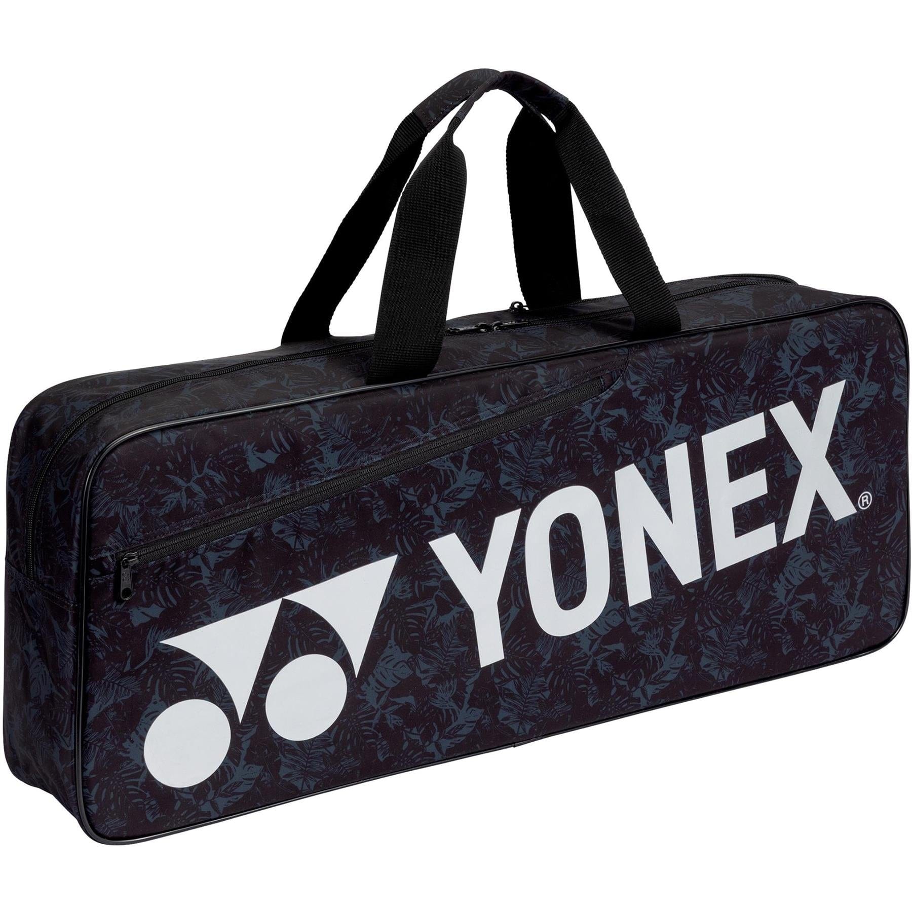 The Yonex 42131W Tournament Badminton Racket Bag in Black Silver features black handles and an abstract dark pattern complemented by a white Yonex logo, making it an ideal choice for tournament players.