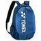 The Yonex 42012S Team Badminton Backpack S in Deep Blue is an ideal choice for carrying your badminton essentials. It features black straps and a front zip pocket, with the Yonex logo and brand name printed in white on the front. This sleek design also includes convenient side pockets for additional storage.