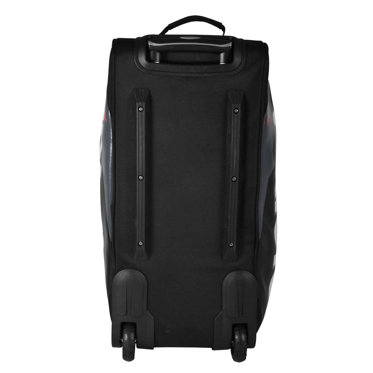 The Victor Multi Sportbag BG9712 Large Travel Badminton Bag, crafted in a sleek black design, is displayed from the back. It showcases sturdy wheels at the bottom and a robust handle at the top to ensure effortless transport, embodying dependable travel luggage.