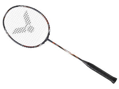 The Victor Auraspeed 100X H badminton racket, by Victor, boasts a sleek grey handle complemented by a striking grey and orange frame. Featuring Sonic-Rebound Technology, the strings create a grid pattern that highlights a central black logo. Set diagonally against a white background, it offers an ideal fusion of style and performance.