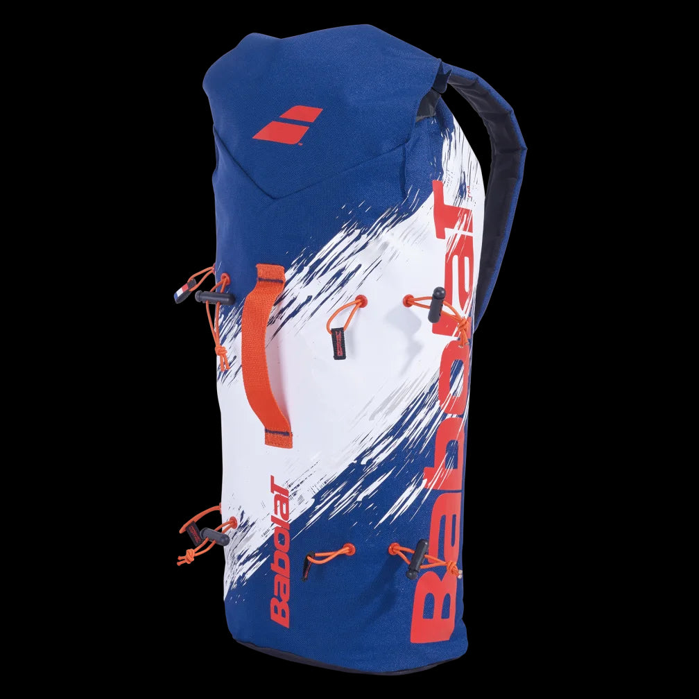 This Navy Blue and White sports backpack with orange accents prominently displays the "Babolat" logo. Designed for badminton, this Babolat sling bag offers racket control holders and zippers on a black background.