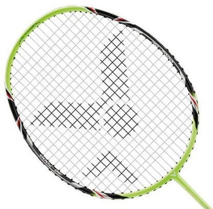 The Victor G-7000 Badminton Racket by Victor showcases a sleek black and green frame crafted from full carbon, making it ideal for beginners. It is equipped with Ashaway Rally 21 Fire strings, highlighted by a unique central pattern and subtle red and black details near the top and sides.