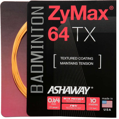 Close-up of an Ashaway Zymax 64 TX badminton string package. The black and red design highlights technical specifications: 0.64 mm gauge, 10 meters length, and advanced ZyWeave string technology. Featuring a textured coating and "Made in USA" text, the orange string is partially visible.