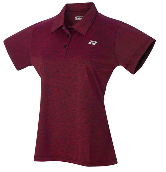 The Yonex YP2003 Red Women's Badminton Polo Shirt provides premium comfort and breathability, featuring short sleeves, a collar, and three buttons. This classic polo is adorned with a small white Yonex logo on the left chest area.