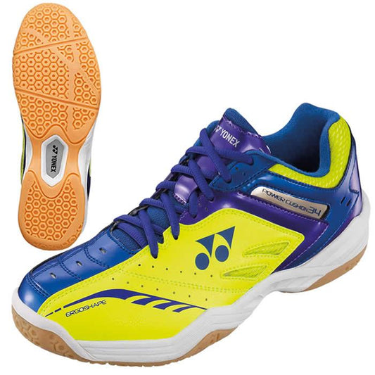 These vibrant Yonex Power Cushion 34 Men's Badminton Shoes come in a striking yellow, blue, and white color combination, making them perfect for any indoor court. Displaying the signature Yonex logo along with "Power Cushion" and "Ergo Shape" design features, they have a separate tan sole with a textured grip that is ideal for badminton. Suitable for UK size 8.5.