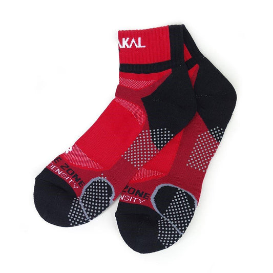 The Karakal X4 Men's Technical Ankle Badminton Socks are red and black athletic socks with white text on the cuff and foot sections, crafted using moisture-wicking material. These socks incorporate various design patterns to provide support, comfort, and shock-absorbing technology.