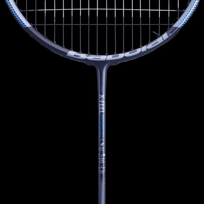 Close-up view of a blue-grey Babolat X-Feel Essential badminton racket set against a black background. The strings and shaft, crafted with Metric Flex technology for improved durability, are visible, and the Babolat brand name appears subtly on the shaft.