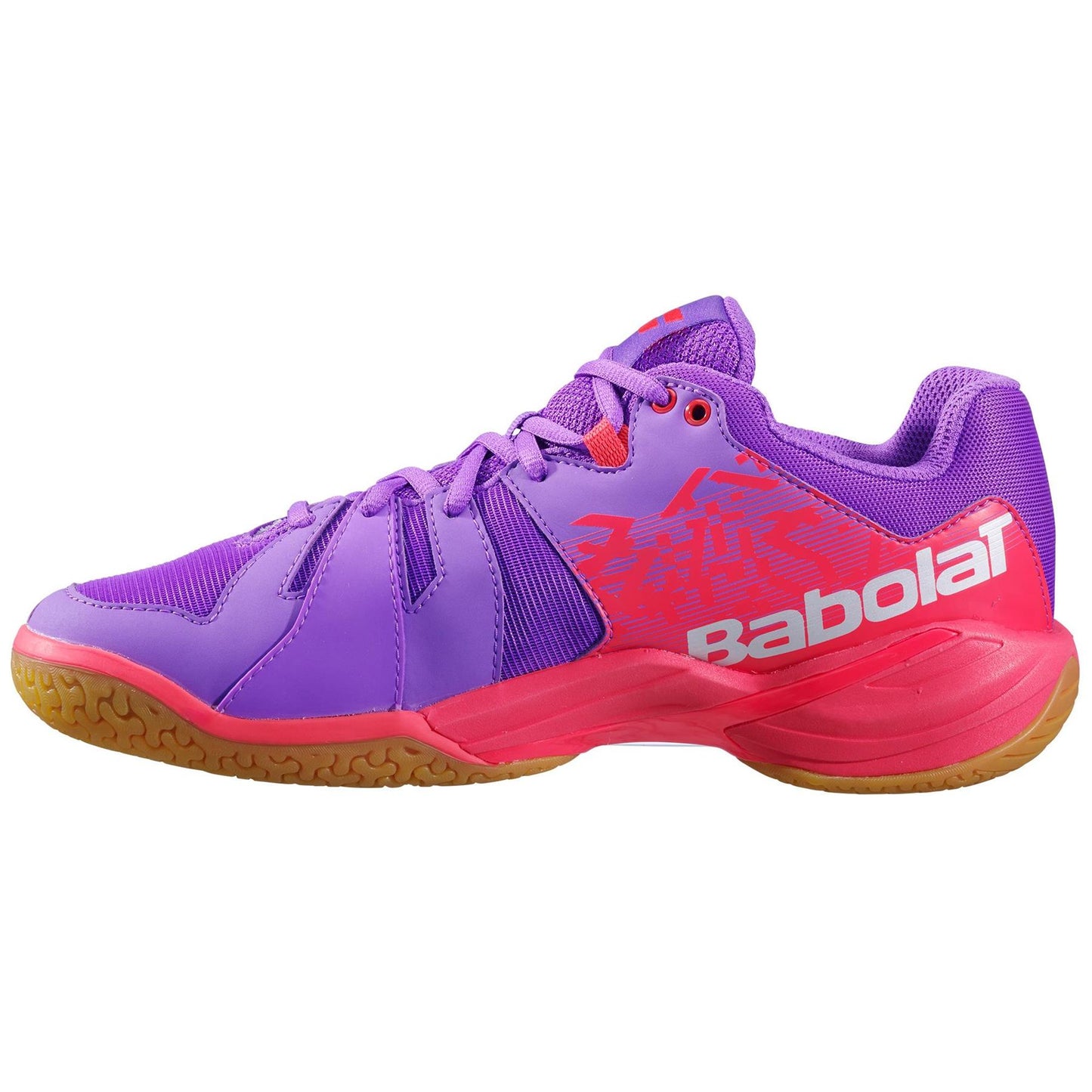 The dynamic Babolat Shadow Spirit Women's Badminton Shoes in Dewberry and Fiery Red feature a vibrant purple upper with striking red and orange accents, complemented by a tan sole crafted from durable Michelin rubber. The white "Babolat" branding adorns the side, while the shoes are equipped with laces and a low-cut design ideal for athletic pursuits.