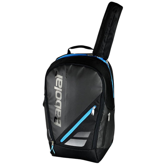 The Babolat Expand Team Line Backpack Blue is a stylish and functional option for tennis enthusiasts. It features an adjustable main compartment for rackets, a front zippered pocket, and an additional side pocket. The brand name is displayed prominently on the front of the black and gray design, complemented by blue accents.