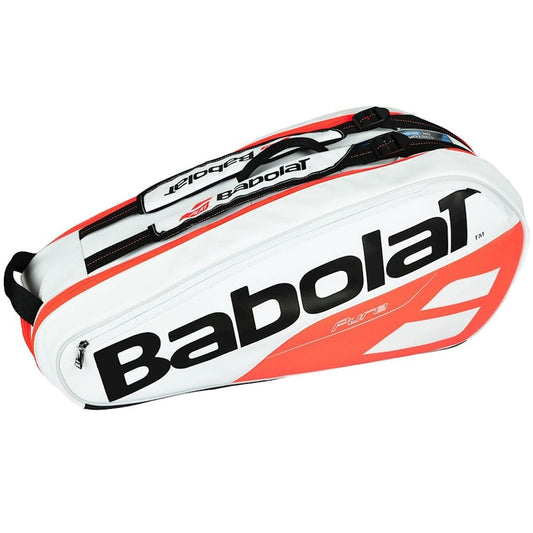 The Babolat Pure Strike Badminton Racket Holder X6 Racket Bag in white and orange prominently displays the brand's logo. It features multiple compartments, including an insulated Thermoguard compartment, and is designed with adjustable shoulder straps. The reinforced shell ensures the secure transportation of your badminton rackets and gear.