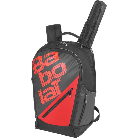 Introducing the Babolat Backpack Expandable Team Line in Black/Red: This bag prominently displays the large Babolat logo on the front. It features several zippered compartments and has an adjustable main compartment, ideal for storing your essentials. Its design allows two tennis racket handles to protrude from the top, highlighting its sport-ready functionality.