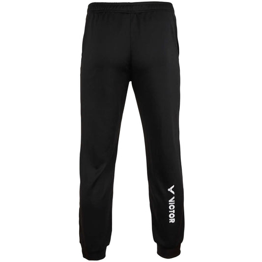 Introducing the Victor Badminton TA Pants Team Black 3697 by Victor: These black sports pants are designed with an elastic waistband and cuffs, providing comfort for any activity. Crafted from breathable fabrics, they feature a small pocket for added convenience and have "VICTOR" printed vertically in white on the lower left leg.