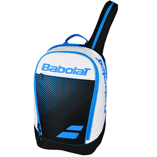 The Babolat Classic Club Backpack in blue from the renowned brand Babolat offers padded shoulder straps for added comfort. It includes a spacious zippered compartment designed to securely hold your rackets and prominently showcases the Babolat logo, along with a handy racquet handle cover.