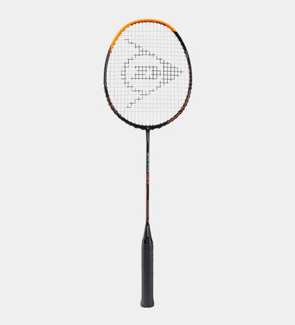 The Dunlop Revo Star Titan 81 Badminton Racket, crafted by Dunlop, boasts a high modulus graphite construction with a black handle and an orange and black frame. The strings are adorned with a geometric logo pattern, complemented by an anti-torsional regulator for exceptional stability. All of this is set against a plain white background.