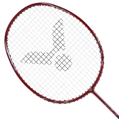 The image showcases a close-up of the Victor Auraspeed 3000S Badminton Racket in red, featuring a sleek, curved frame with white string pattern and a distinctive black logo. Set against a plain white background, the isometric racket head is perfectly highlighted, making it ideal for intermediate-level players.