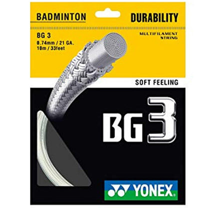 An image displays a Yonex badminton string package labeled "BG 3." The packet, named Yonex BG 3 Badminton String White - 0.74mm 10m, highlights its premium nylon fibers and multifilament core. Features such as "soft feeling" and "long durability" are prominently showcased on the front, along with measurements of 0.74mm and a length of 10 meters.