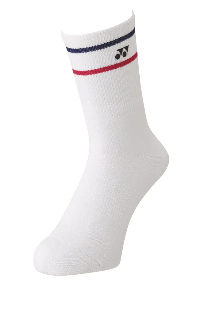 These durable Yonex 19172 Badminton Crew Socks feature a sleek white design with red and blue stripes near the top and a small black logo beneath. Perfect for active wear, they offer both style and breathability against a plain white background.