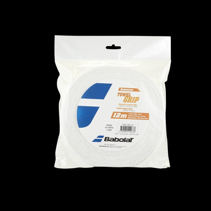 A package of the Babolat Badminton Towel Grip 12m Roll - White against a black background showcases the clear packaging that reveals the white grip inside. Its 12-meter length and superior moisture absorption are prominently highlighted, making it perfect for maintaining player grip in humid conditions.