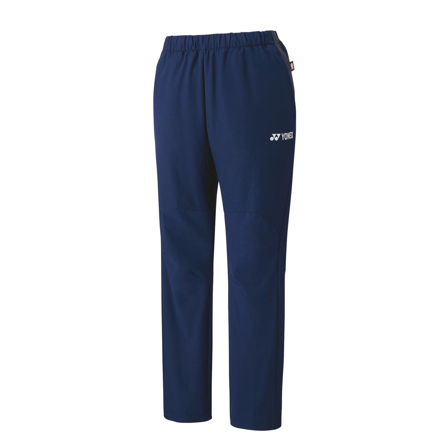 Discover the Yonex 80090 Tracksuit Pants in navy blue, designed with an elastic waistband and a straight-leg style. These lightweight pants incorporate Heat Capsule technology, making them ideal for sports activities. The "YONEX" logo is positioned near the waist on one side, combining both style and practicality.