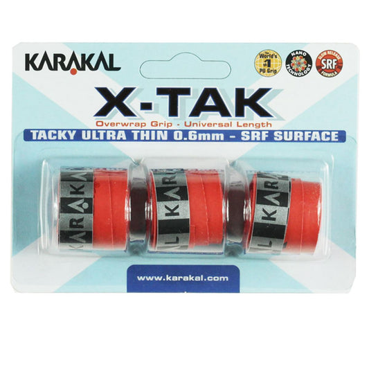 The Karakal X-Tak Overwrap Badminton Grip packaging contains four rolls of red grip tape with the Karakal branding. Highlighting features like "Tacky Ultra Thin 0.6mm," "SRF Surface," and micro holes designed for a secure, non-slip grip, the pack is also embellished with additional branding logos.