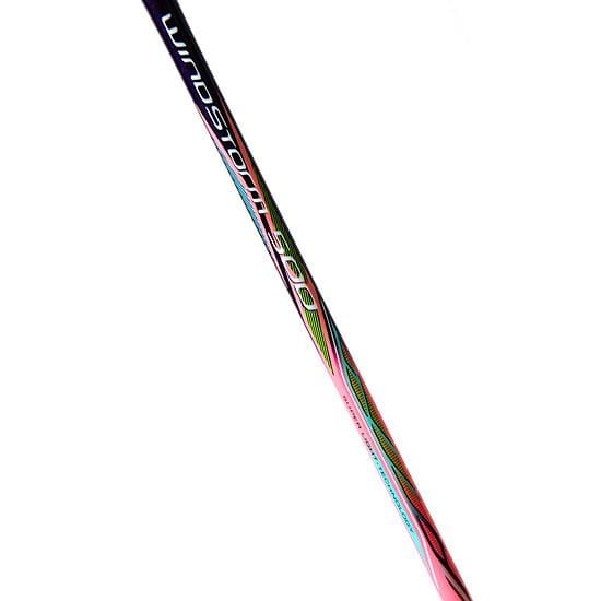 A close-up of the Li-Ning Windstorm 500 Badminton Racket's shaft, displaying its name. The design features a gradient pattern with vibrant shades of pink and purple, enhancing speed and power production against a white background.