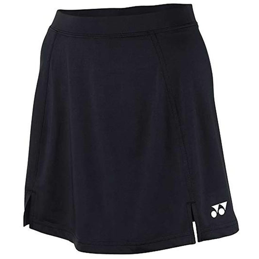 The Yonex YSK3000 Black Badminton Skort is a stylish black women's skirt featuring a subtle side slit and a discreet white Yonex logo near the hem. It is made from smooth, lightweight, stretchable fabric that makes it perfect for both sports and casual wear.