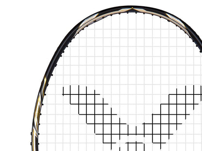 Here's an alternative version of the sentence using the provided product data:

Close-up of a badminton racket head with strings arranged in a pattern resembling the letter "X." The black frame, crafted from Japanese carbon fibre, features subtle golden touches, reminiscent of the sleek design of the Victor Jetspeed S10C.